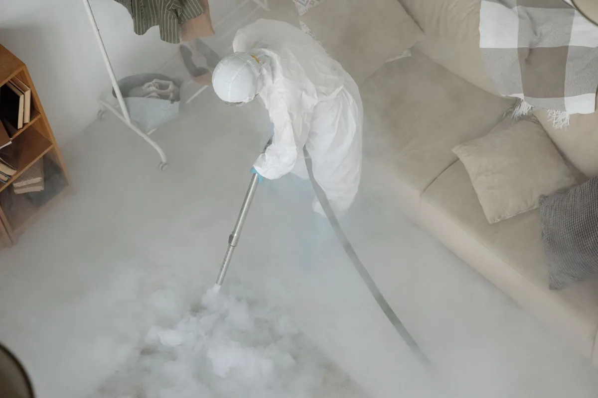 Biohazard cleanup technician in protective equipment, Arroyo Grande, CA